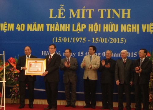 Mít tinh kỷ niệm 40 năm thành lập Hội hữu nghị Việt-Lào (15/1/1975-15/1/2015) - ảnh 1